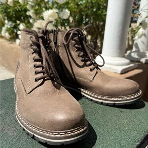 Brown Leather Boots with Lace-Up Design and Durable Soles